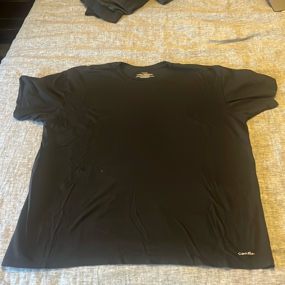 Men’s calvin klein black tee. XL. Good used condition
